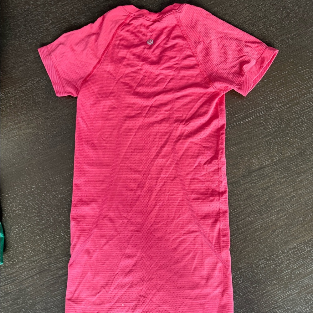 Pink Lululemon hip length Swiftly - tag removed for comfort